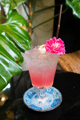 Lychee fruit refreshment in high Glass with straw tube with ice and topping decoration for customer, Fresh smoothies Juice natural to make diet good health for Lunch table bar window seat