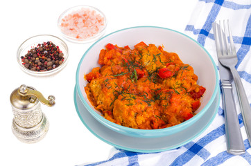 Meatballs meat, fish in tomato sauce with vegetables.