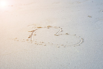 Heart shape on the beach by the sea,concept love day valentine's day