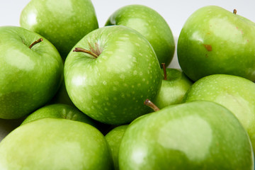 Close-up of a group of fresh green Granny Smith cooking apples.