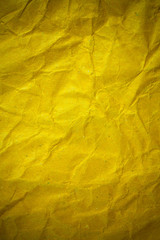 Texture crumpled yellow paper background.