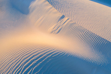 Naklejka na ściany i meble dawn light, sand dune patterns