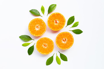 Fresh orange citrus fruit with leaves on white background. Juicy, sweet and high vitamin C