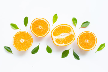 High vitamin C. Fresh orange citrus fruit with leaves isolated on white background.