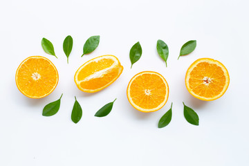 High vitamin C. Fresh orange citrus fruit with leaves isolated on white background.