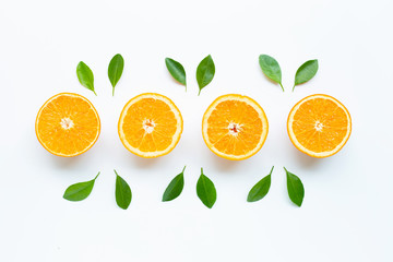 High vitamin C. Fresh orange citrus fruit with leaves isolated on white background.