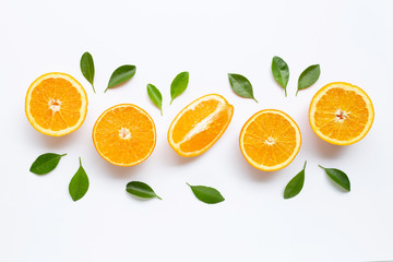 High vitamin C. Fresh orange citrus fruit with leaves isolated on white background.