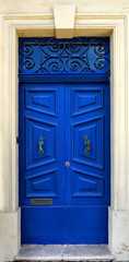 close up retro style old house door of Mediterranean architectural culture in Mediterranean island Malta