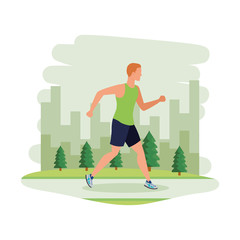 Fototapeta premium young athletic man running in the landscape