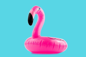 Giant inflatable Flamingo on a blue background, pool float party, trendy summer concept