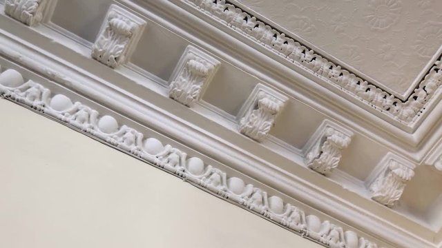 Traditional cornicing / moulding on a ceiling in a bright room | Retro interior design | Shot in HD at cinematic 24 fps