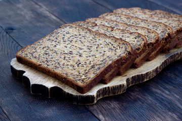 Bread slices on wooden oak table