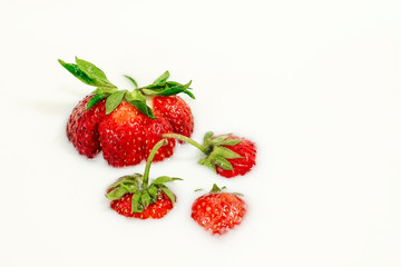 Red natural ripe strawberries in milk cream