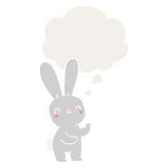 cute cartoon rabbit and thought bubble in retro style