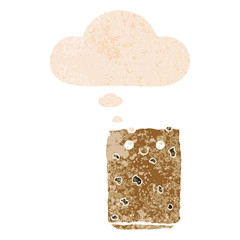 cartoon biscuit and thought bubble in retro textured style