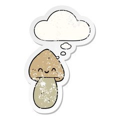 cartoon mushroom and thought bubble as a distressed worn sticker
