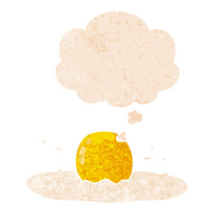 cartoon fried egg and thought bubble in retro textured style