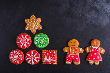 Christmas homemade gingerbread cookies on a dark background