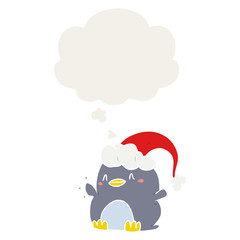 cartoon penguin wearing christmas hat and thought bubble in retro style