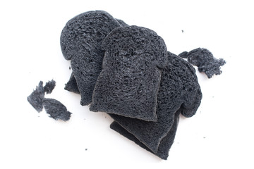 Organic bio charcoal bread isolated on white