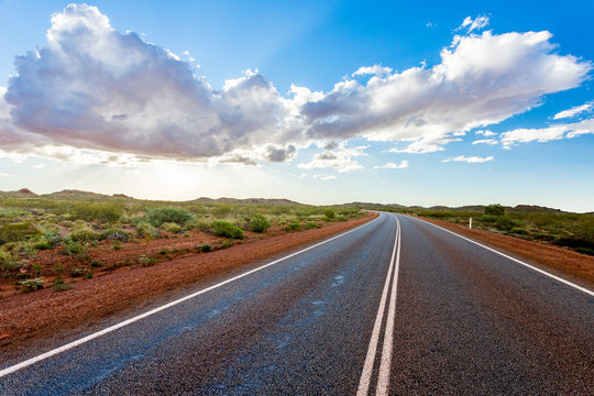Photograph of Australian outback highway in Western Australia. Pilbara region, Western Australia.
