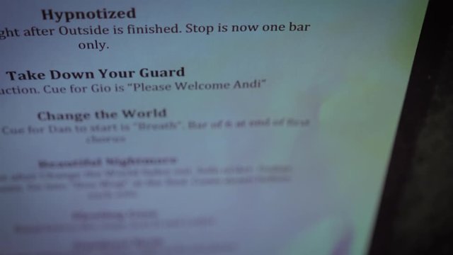 A close up of a concert set list.