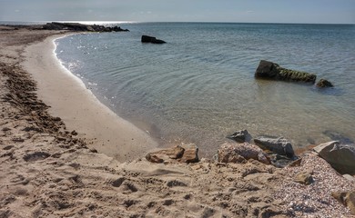 Shore of the Azov Sea in the morning sun.