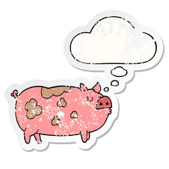 cartoon pig and thought bubble as a distressed worn sticker