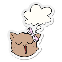 cartoon cat face and thought bubble as a printed sticker