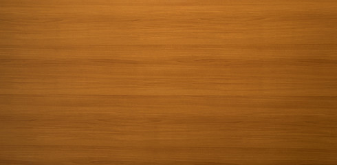 Natural brown wooden panel with decorative grain