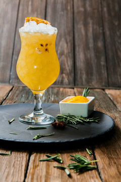 Lemonade or juice. Alcohol drink or cocktail. Images for bar or restaurant menu. Yellow drink with ice