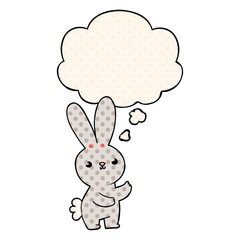 cute cartoon rabbit and thought bubble in comic book style