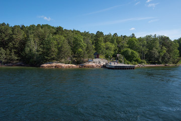 The commuting boat jetty at the island Södra Grinda in the Stockholm archipelago a sunny sommer day