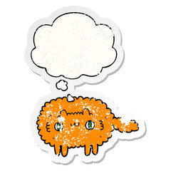 cartoon cat and thought bubble as a distressed worn sticker