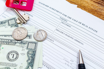 House, home, property, real estate purchase buying sale contract agreement pen money coins keys wooden background, expenses, buying, investment, finance, savings, concept close up selective focus