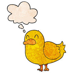 cartoon duck and thought bubble in grunge texture pattern style