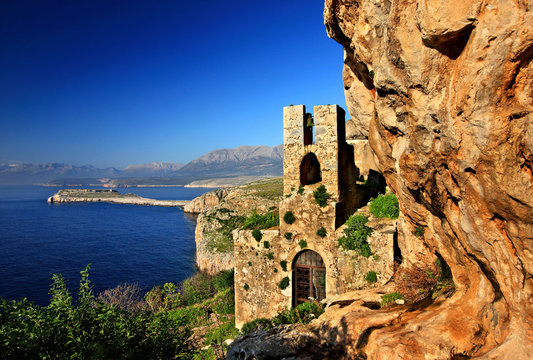 The "hidden" byzantine church of Agitra (also known as "Panagia Odigitria") with Cape Tigani in the background. Mani region, Lakonia prefecture, Peloponnese, Greece 