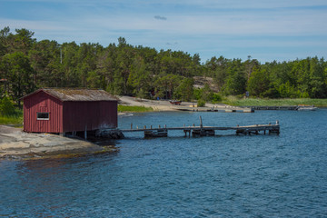 Fototapeta na wymiar Islands in the Stockholm outer archipelago a sunny sommer day at the bay Långvik