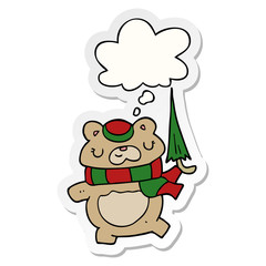 cartoon bear with umbrella and thought bubble as a printed sticker