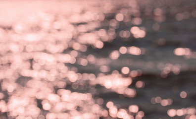 Beautiful background, view of the blurred sea, sun glare. Blur