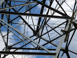 Steel Metal electricity pole antenna in blue background