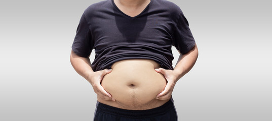 fat man touching his belly , isolated on white background.Concept for Fitness Gym Strong.