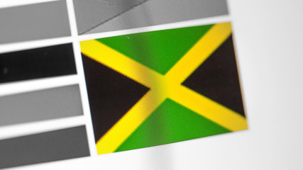 Jamaica national flag of country. Jamaica flag on the display, a digital moire effect.