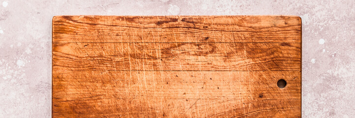 Old Chopping Board on Pink Background