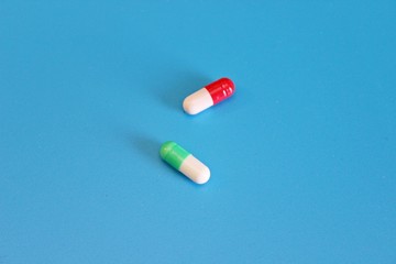 Pharmacology pills on blue background