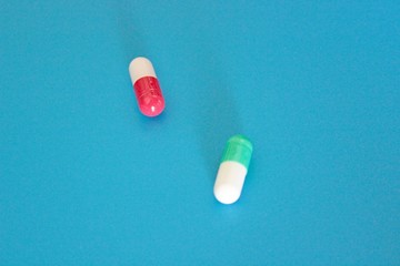 Pharmacology pills on blue background