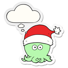 cartoon octopus wearing christmas hat and thought bubble as a printed sticker