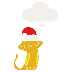cute cartoon cat wearing christmas hat and thought bubble in retro style