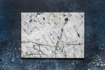 Marble Board on Blue Background