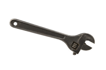 Swedish adjustable wrench. Old metallic key on an isolated white background. Plumbing repair tool.